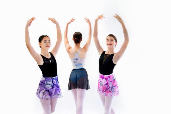 Three girls in ballet shoes